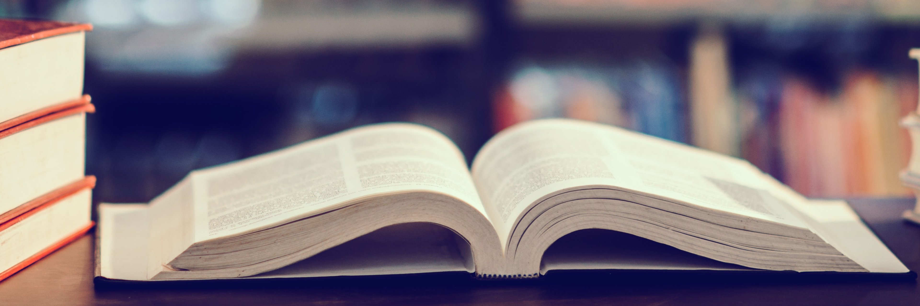 Book in library with open textbook,education learning concept